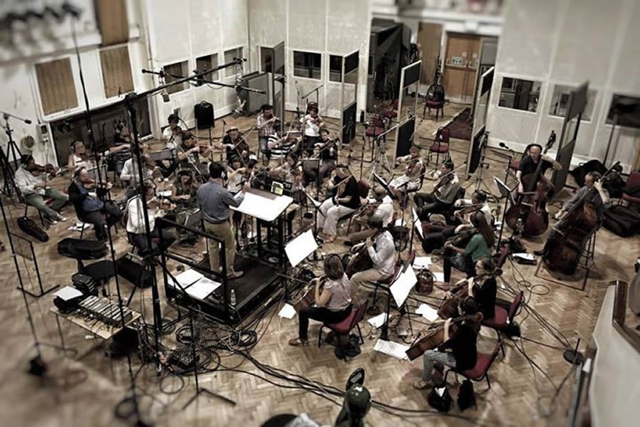 Composer of Film & TV Music Conducting Orchestra at Abbey Road Recording Studio